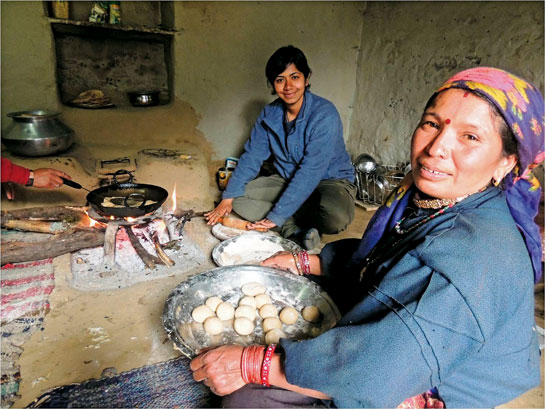 When not collecting data, the author helped village women with household chores.